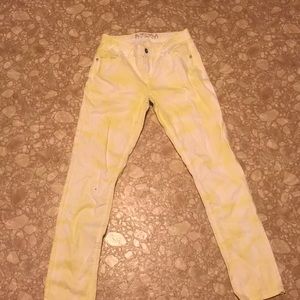 tie dyed white and yellow pants
